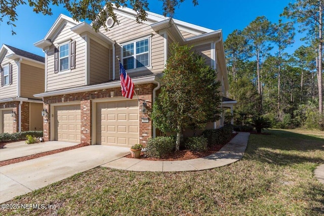 view of front of home featuring a garage and a front lawn