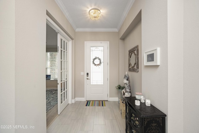 entryway with french doors and ornamental molding