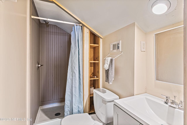 bathroom featuring toilet, vanity, a shower with shower curtain, and lofted ceiling