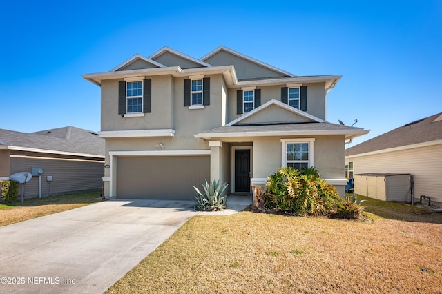 view of front of home with a garage and a front yard