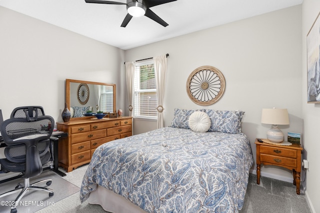 bedroom with ceiling fan and carpet