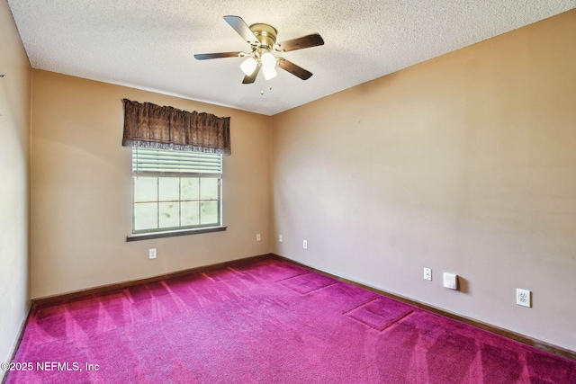 empty room featuring ceiling fan, a textured ceiling, and carpet flooring