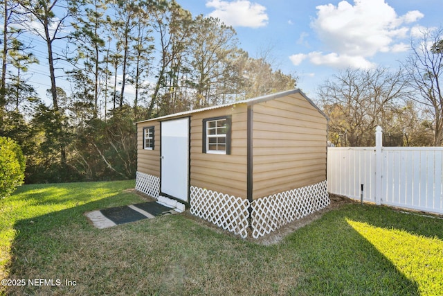 view of outdoor structure featuring a yard