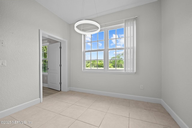 view of tiled spare room