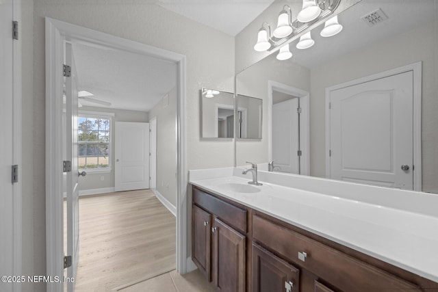 bathroom featuring tile patterned floors and vanity