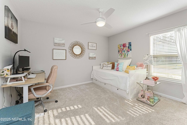 bedroom with ceiling fan, light carpet, and multiple windows