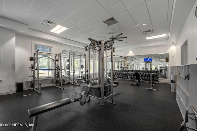 workout area featuring a paneled ceiling