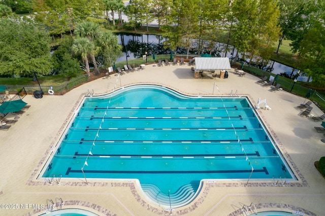 view of swimming pool featuring a patio area