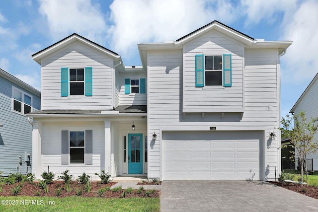 view of front of house with a garage