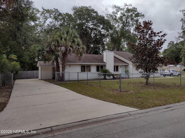 view of front facade with a front lawn