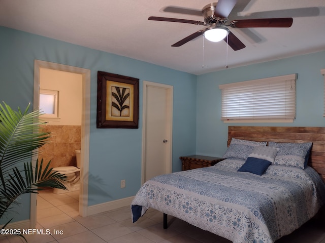 bedroom with ceiling fan and light tile patterned flooring