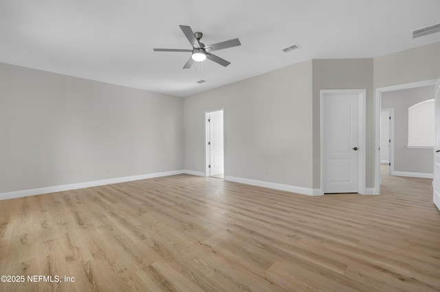 spare room with ceiling fan and light hardwood / wood-style flooring