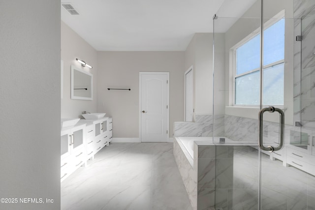 bathroom featuring vanity and plus walk in shower