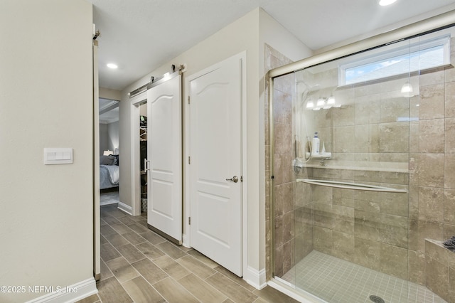 bathroom with a shower with shower door