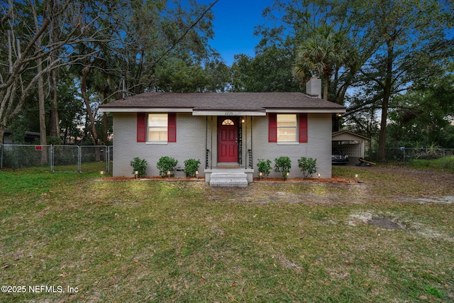 view of front of home with a front lawn