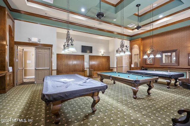 recreation room with a high ceiling, pool table, dark colored carpet, a raised ceiling, and crown molding