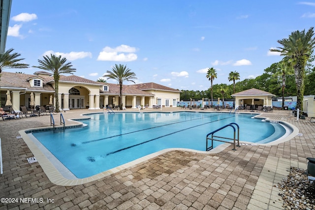 view of swimming pool with a patio area