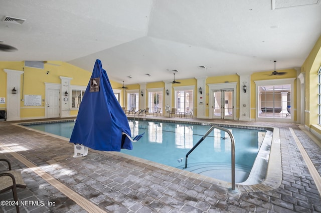 view of swimming pool featuring ceiling fan