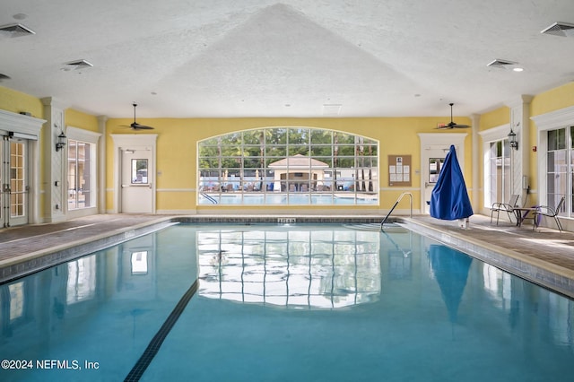 view of swimming pool with ceiling fan