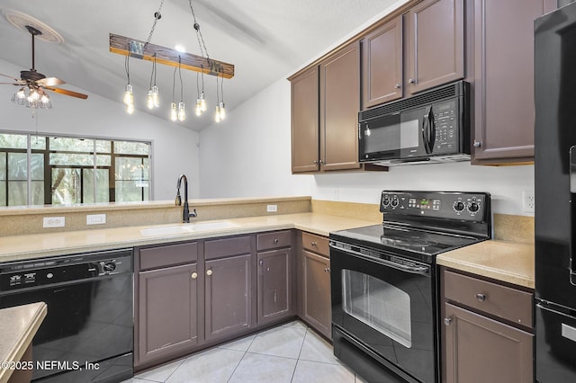 kitchen featuring black appliances, sink, vaulted ceiling, ceiling fan, and dark brown cabinets