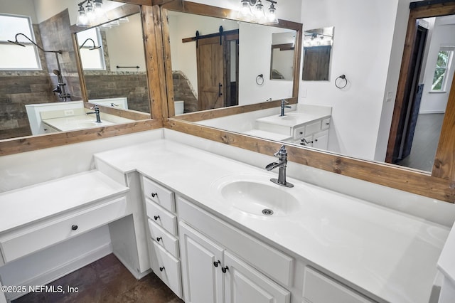 bathroom featuring vanity and a tile shower