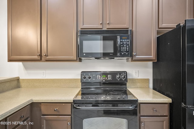 kitchen featuring black appliances