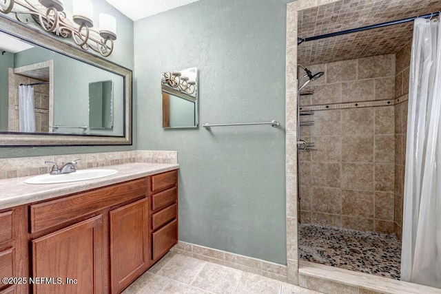 bathroom featuring curtained shower and vanity