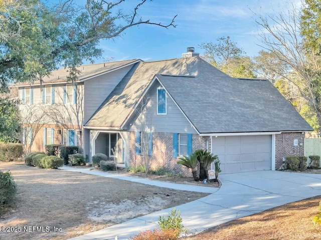 view of front of home with a garage