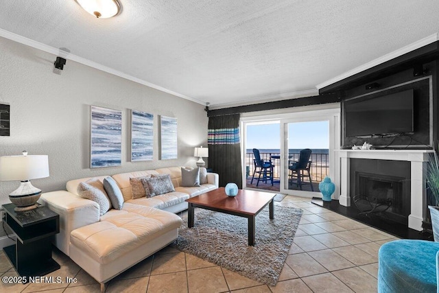 living room with crown molding, light tile patterned floors, and a textured ceiling