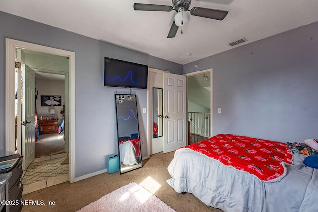 carpeted bedroom featuring ceiling fan