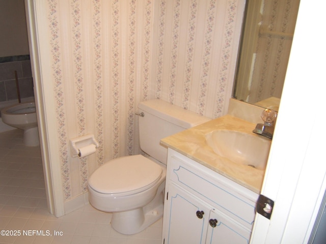 9252 San Jose Blvd Unit 3701, Jacksonville, FL 32257 - half bathroom featuring tile patterned floors, toilet, and vanity