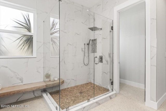 211 Belvedere St, Atlantic Beach, FL 32233 - full bath featuring a marble finish shower, speckle patterned floor, and baseboards