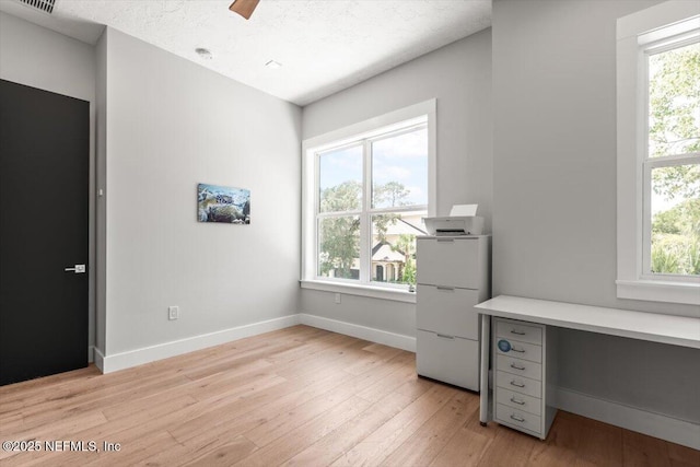 211 Belvedere St, Atlantic Beach, FL 32233 - unfurnished office featuring light wood-type flooring, baseboards, and ceiling fan