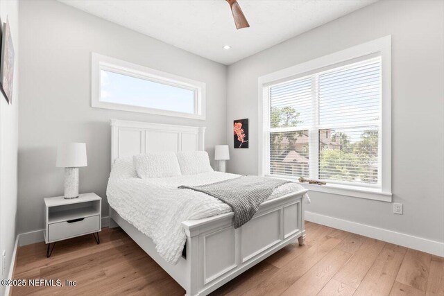 211 Belvedere St, Atlantic Beach, FL 32233 - bedroom featuring baseboards, light wood-style flooring, ceiling fan, and recessed lighting