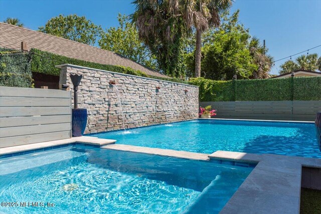 211 Belvedere St, Atlantic Beach, FL 32233 - view of pool with a pool with connected hot tub and a fenced backyard
