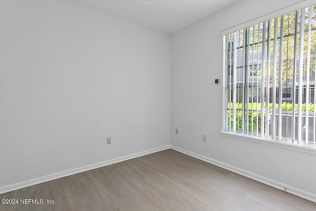 empty room featuring hardwood / wood-style flooring