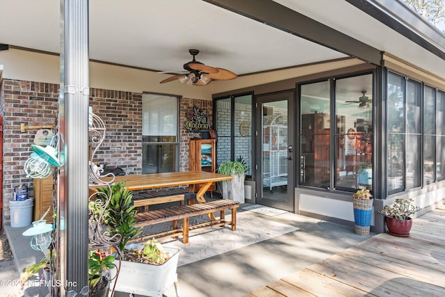 exterior space featuring ceiling fan