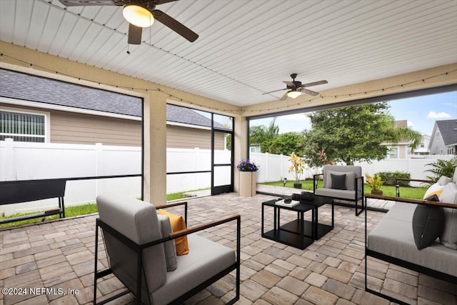 view of patio / terrace with ceiling fan and outdoor lounge area