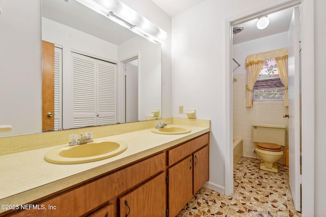 full bathroom featuring vanity, toilet, and shower / bath combination