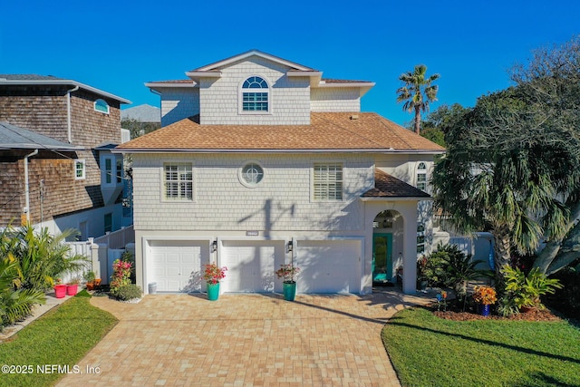 view of property featuring a garage