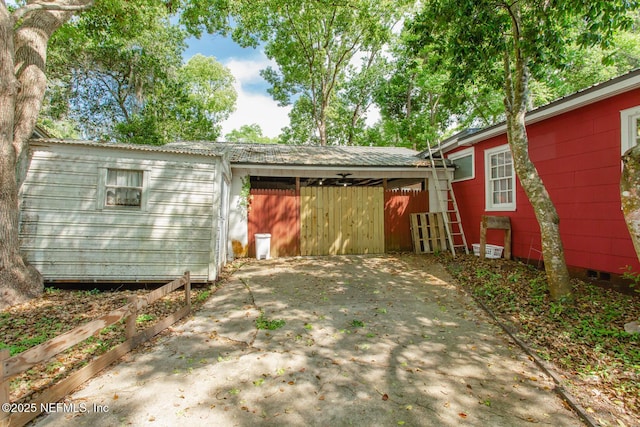 exterior space featuring a carport