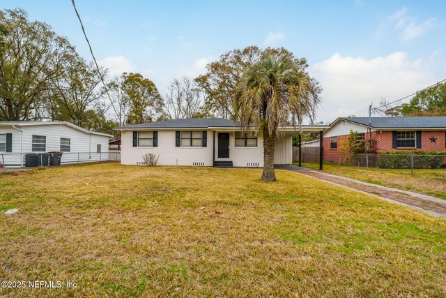 single story home with a front lawn