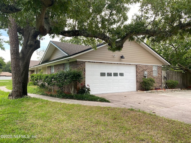 view of property exterior featuring a garage and a lawn