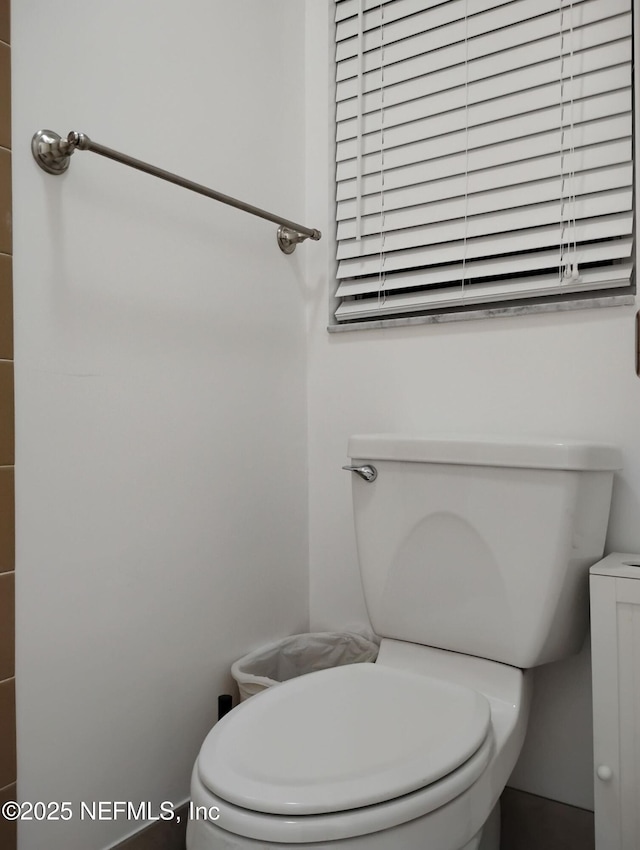 bathroom featuring toilet