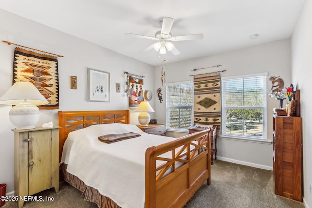 bedroom featuring dark colored carpet and ceiling fan