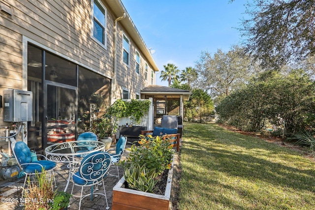 view of yard featuring a sunroom