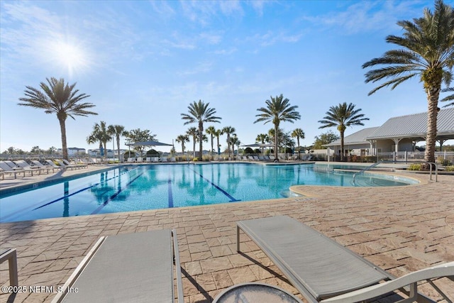 view of pool featuring a patio area