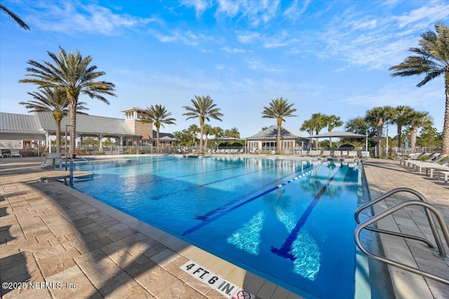 view of swimming pool featuring a patio