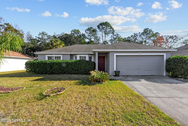 ranch-style home featuring a front yard and a garage