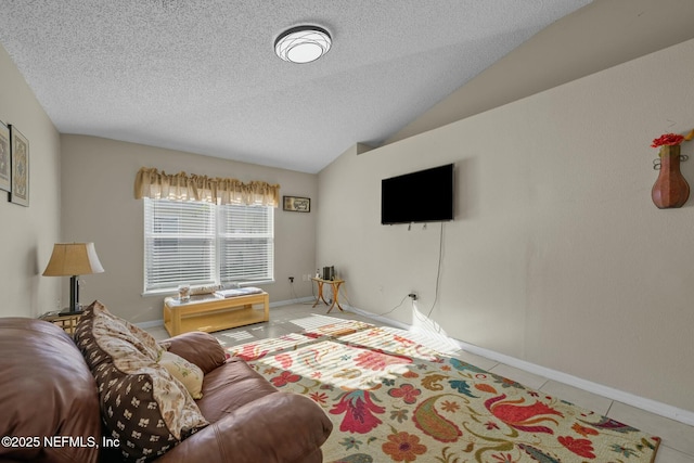 tiled living room with vaulted ceiling and a textured ceiling